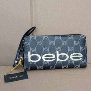 NWT Bebe Wristlet Zip Around Wallet Black Pebbled Faux Leather Large Logo.